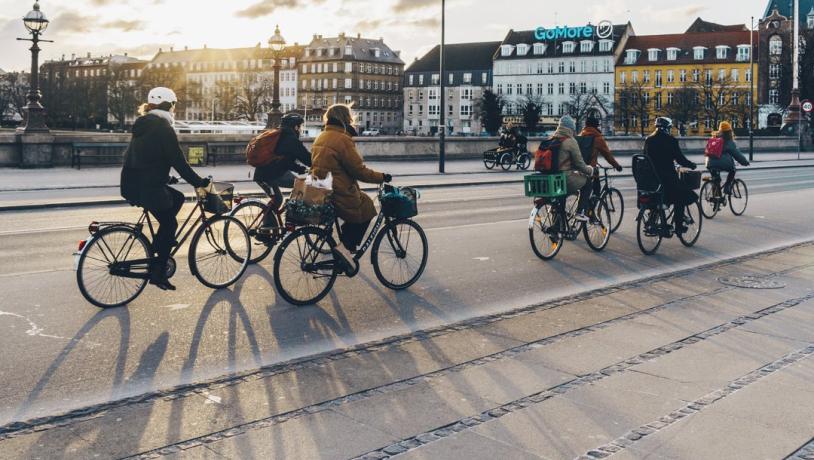 People cycling on Queen Louise's Bridge in winter, Copenhagen