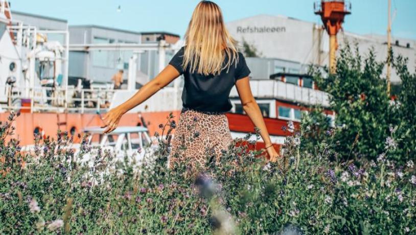 Woman wandering at Reffen street food market in Copenhagen