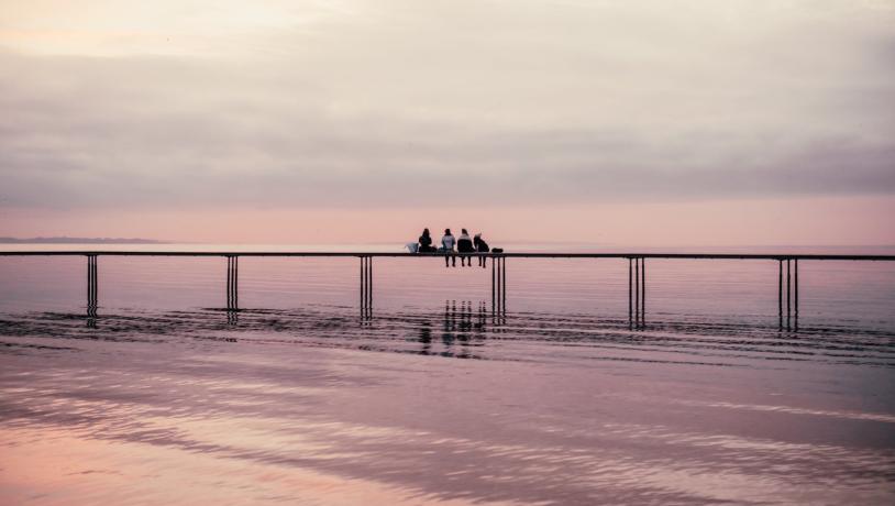 People sitting on the Infinity bridge