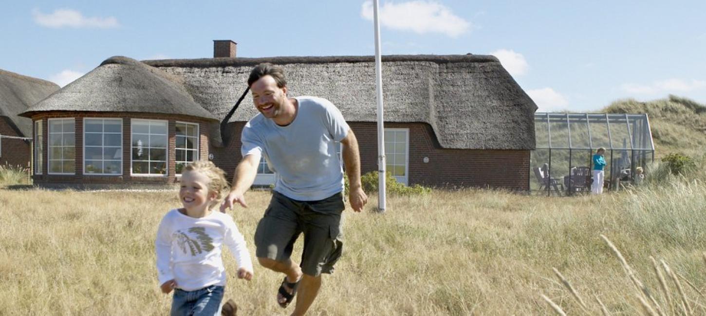 Family playing at holiday home, North Zealand in Denmark