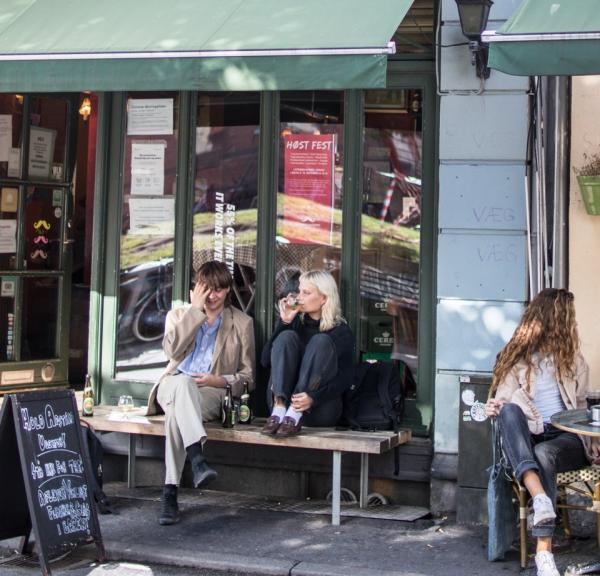 People sitting at café in Latin Quarter, Aarhus